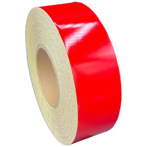 May include: A roll of bright red reflective tape. The tape is wound around a cardboard core.