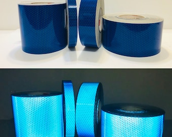 May include: Two rolls of blue reflective tape and two rolls of light blue reflective tape. The tape is diamond shaped and has a grid pattern.