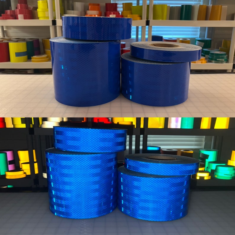 Puede incluir: Dos rollos de cinta reflectante azul, un rollo est&aacute; apilado sobre otro rollo. Los rollos est&aacute;n sobre una superficie blanca.