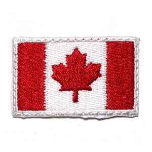 May include: Embroidered patch featuring the Canadian flag. The flag design includes a central red maple leaf on a white background, flanked by two vertical red stripes. The patch has a white border.