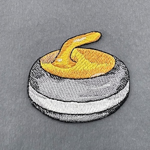 Curlinglapp, Stryklapp för curlingsten, Broderad curling