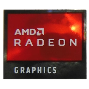 May include: A red and black sticker with the AMD Radeon Graphics logo. The logo is white and has a red background. The text "AMD Radeon Graphics" is printed on the sticker.