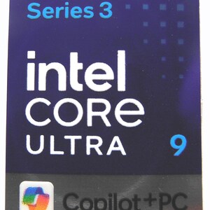 May include: A rectangular sticker with a dark blue background featuring the white text Series 3, intel CORE ULTRA, and the number 9 in light blue. At the bottom, a small square icon with a multicoloured pattern sits next to the black text Copilot+PC.