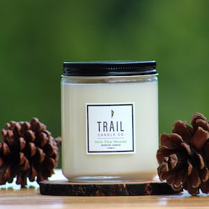 Into The Woods- Scented soy wax candle- clear jar with lid.