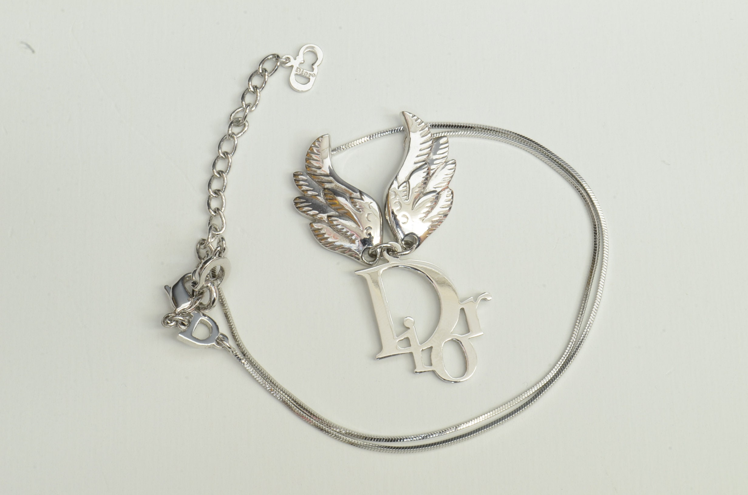 Dior angel wing necklace deals