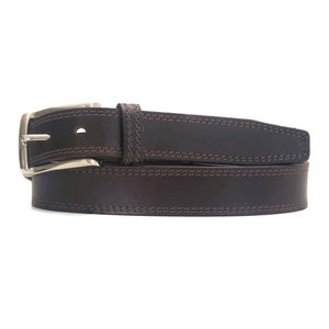 May include: A dark brown leather belt with a silver buckle and double stitching. The belt is made of high-quality leather and has a classic design.