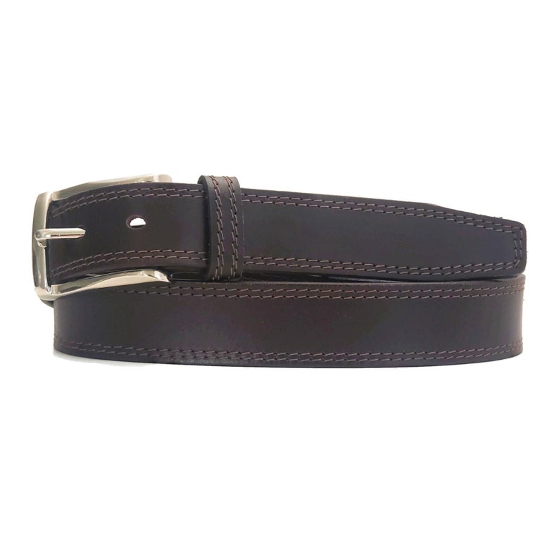 May include: A dark brown leather belt with a silver buckle and double stitching. The belt is made of high-quality leather and has a classic design.