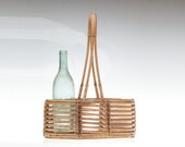 Vintage Boho Rattan bottle basket Mid Century wicker bottle holder