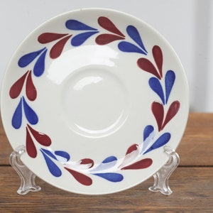 Set of 7 Belgian Ceramic Plates by BOCH, Made in Belgium, Vintage saucers with floral pattern