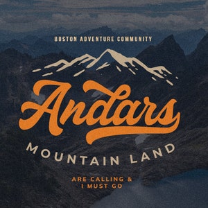 May include: A vintage-style logo with the text "Andars Mountain Land" in orange script font. The logo is set against a backdrop of a mountain range with snow-capped peaks. The text "Boston Adventure Community" appears above the logo, and the text "Are Calling & I Must Go" appears below the logo.