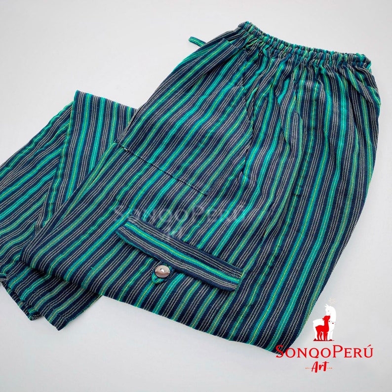 May include: Green and black striped pants with a drawstring waist and a pocket on the side. The pants are made of a soft, comfortable fabric and have a relaxed fit.