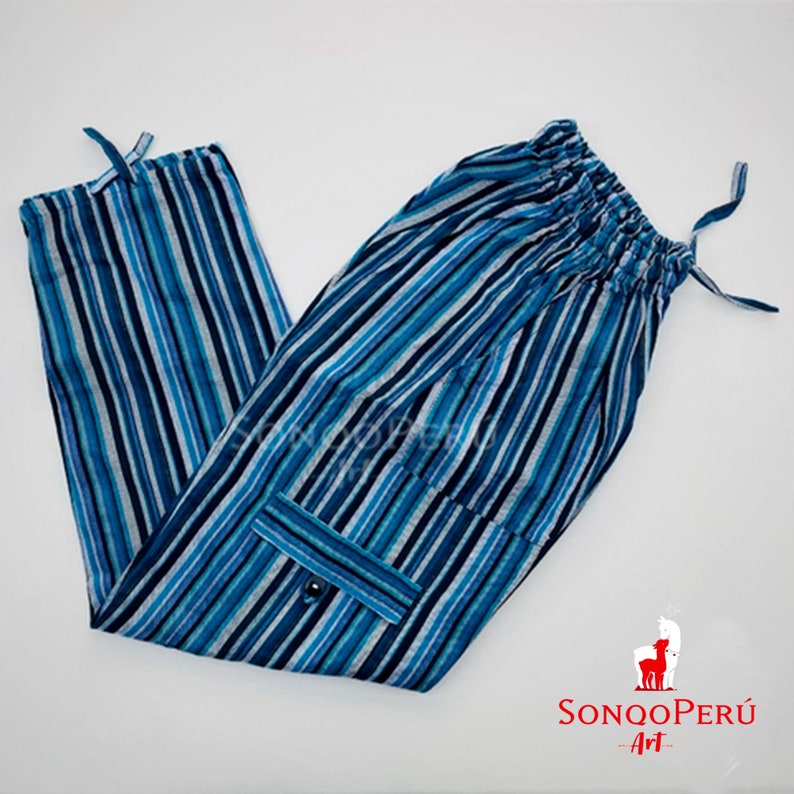 May include: Blue and white striped pants with a drawstring waist and a single cargo pocket. The pants are made of a soft, lightweight fabric.