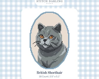 May include: A digital cross stitch pattern featuring a gray British Shorthair cat with orange eyes inside an oval frame. The text reads Stitch Darling Studio, British Shorthair, 18 Count | 3.5" x 5.1", and Digital Stitch Chart.