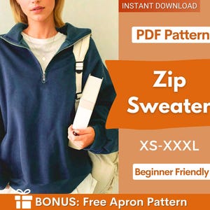 Könnte beinhalten: Ein dunkelblauer Pullover mit kurzem Reißverschluss, Stehkragen und langen Ärmeln. Das Bild enthält den Text: PDF Pattern, Zip Sweater, XS-XXXL, Beginner Friendly und BONUS: Free Apron Pattern. Der Pullover wird über einem weißen Shirt getragen.