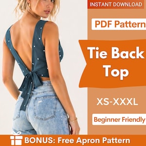 Op de afbeelding: Een teal top met strik aan de achterkant en witte hartvormige stippen. De top wordt gecombineerd met een lichtblauwe spijkerbroek. Tekst op de afbeelding luidt "Tie Back Top", "XS-XXXL" en "Beginner Friendly". Inclusief een gratis schortpatroon als bonus.