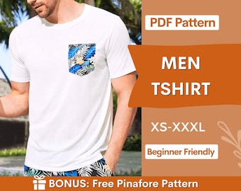 May include: A white t-shirt with a chest pocket featuring a blue, black, and white tropical leaf and flower pattern. The image includes text: PDF Pattern, MEN TSHIRT, XS-XXXL, Beginner Friendly, and BONUS: Free Pinafore Pattern.
