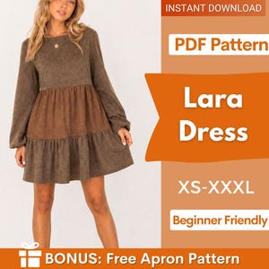May include: A brown long-sleeve dress with a tiered skirt and a contrasting brown panel. The image includes text that reads "Lara Dress" and "XS-XXXL". The dress pattern is labeled as "Beginner Friendly" and includes a bonus free apron pattern.