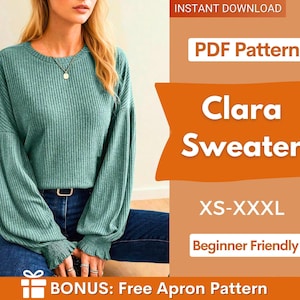 Può includere: Un maglione a maniche lunghe a coste color verde acqua con polsini arricciati e scollo rotondo. L'immagine include il testo: INSTANT DOWNLOAD, PDF Pattern, Clara Sweater, XS-XXXL, Beginner Friendly e BONUS: Free Apron Pattern.
