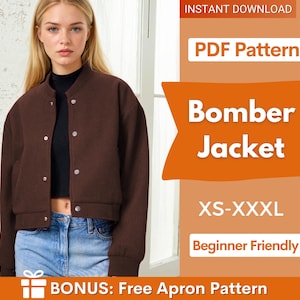 May include: A brown bomber jacket with a black turtleneck and blue jeans. The jacket has a button-up front and is cropped at the waist. The image also includes text that says "Bomber Jacket" and "XS-XXXL".