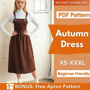 Könnte beinhalten: Ein braunes Trägerkleid mit vorne gebundenen Schulterträgern, getragen über einem weißen langärmeligen Oberteil mit Stehkragen. Das Bild enthält den Text: INSTANT DOWNLOAD, PDF Pattern, Autumn Dress, XS-XXXL, Beginner Friendly, BONUS: Free Apron Pattern.