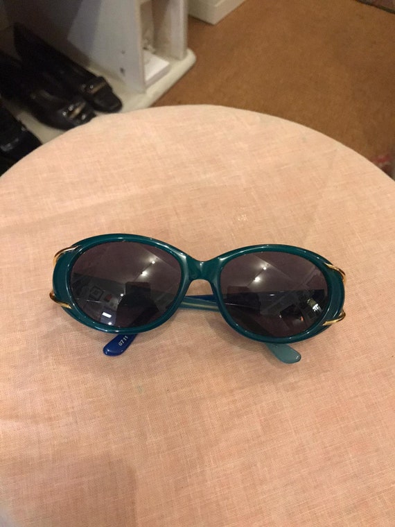Jean Patou blue glasses