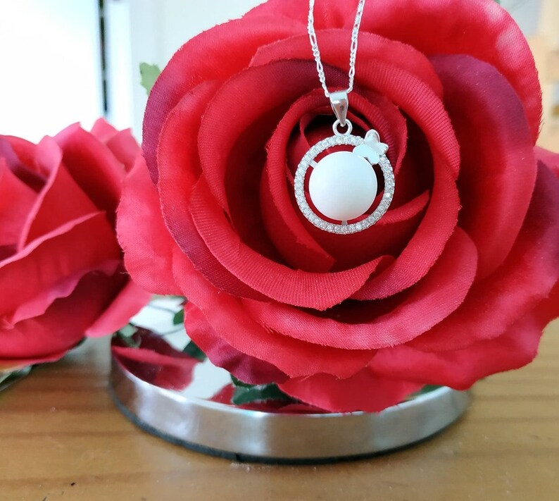 Butterfly breast milk pendant