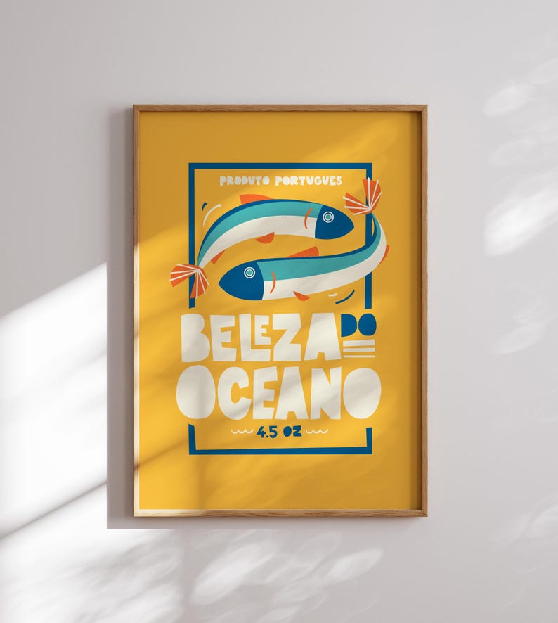 A bright yellow Almanac Co Prints poster featuring two colorful fish with the text "Beleza do Oceano" in bold lettering, Portuguese style.