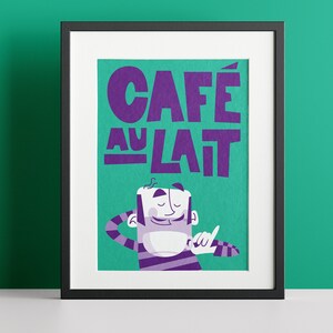 Almanac Co Prints framed 'Café au Lait' poster with bold purple text and a cheerful character, set against a green background for fun kitchen decor. Framed against a green wall.