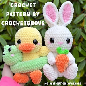 May include: Crochet pattern for a yellow duck with an orange beak and green and orange inner tube, a white bunny with pink ears holding a green and orange carrot, and a green frog.  The pattern is called "Crochet Grove".  "No Sew Option Available" is written at the bottom of the image.
