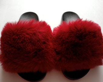 red and black fluffy slides