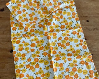 Pair of unused cotton retro pillow cases with orange flowers