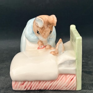 Collectible Royal Albert figure “Peter in Bed” from Beatrix Potter stories.