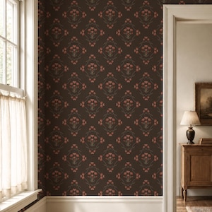 May include: Wallpaper featuring a dark brown background with a repeating pattern of small, muted red floral bouquets enclosed within thin, diamond-shaped outlines formed by delicate, intertwining stems and leaves in a soft, muted green tone.