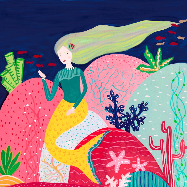 May include: A mermaid with long blonde hair sits on a coral reef. She has a green top and a yellow tail. The background is a dark blue with red and green coral.