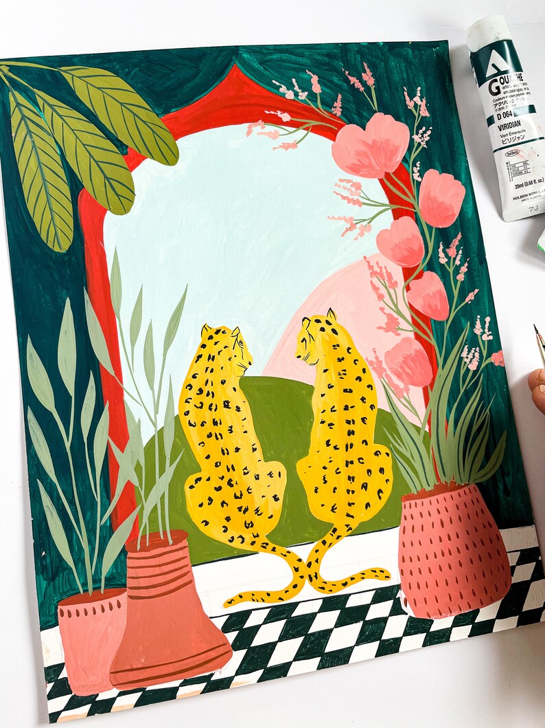 May include: A painting of two yellow leopards with black spots sitting in front of a red and green archway. The archway is framed by pink flowers and green leaves. The leopards are facing each other and have their tails intertwined. The background is a light blue sky with pink clouds.