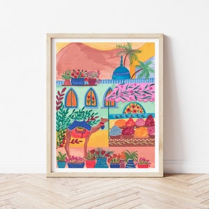 May include: A colorful illustration of a camel standing in front of a building with a pink awning. The building has blue windows and a blue dome on top. There are potted plants and flowers on the roof and in front of the building.