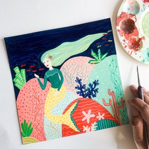May include: A colorful painting of a mermaid with long green hair and a yellow tail, swimming in a coral reef. The painting features a variety of coral, fish, and other sea life.