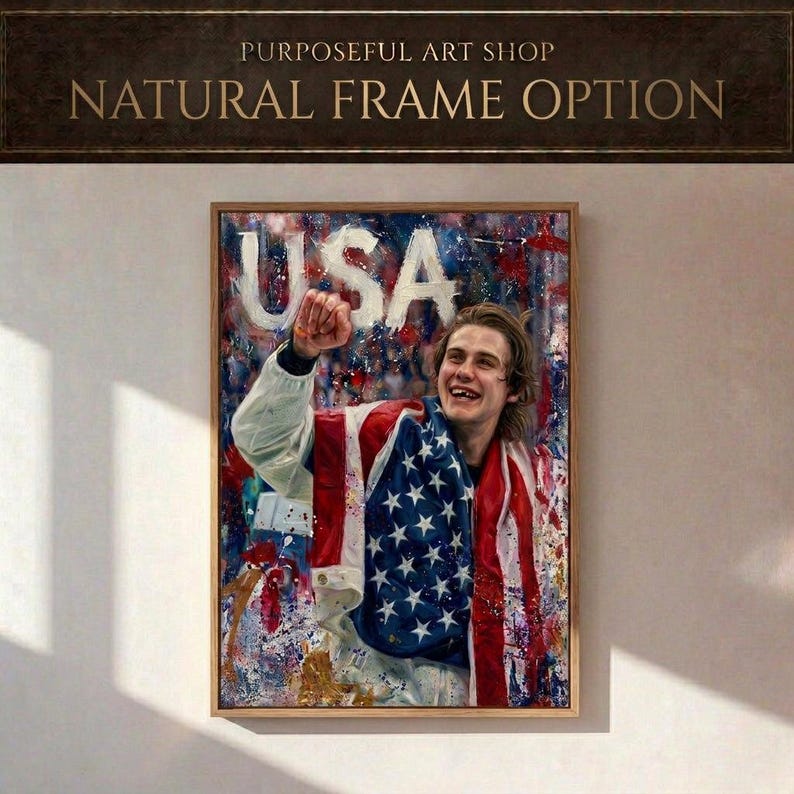 Pode incluir: Uma impress&atilde;o de arte emoldurada com uma pintura de uma pessoa envolta em uma bandeira americana, com a palavra "USA" em letras brancas grandes. A obra de arte tem um fundo colorido e abstrato e &eacute; rotulada como "Purposeful Art Shop" com "Natural Frame Option".
