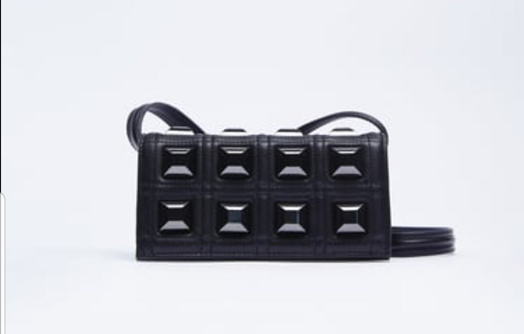 70's Crossbody/Side Sling With A Finish Of Classic Studs. Super Sexy Classic For That Chic Look On That day Out With Magnetic Clasp Closure