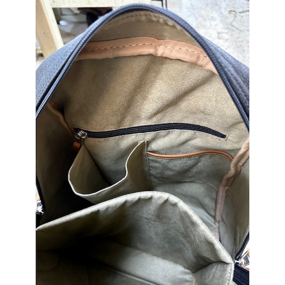 Leather tennis backpack discount
