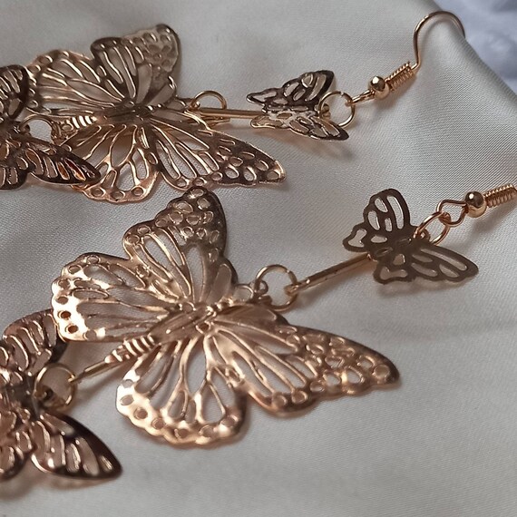 Gold butterfly drop earrings clearance