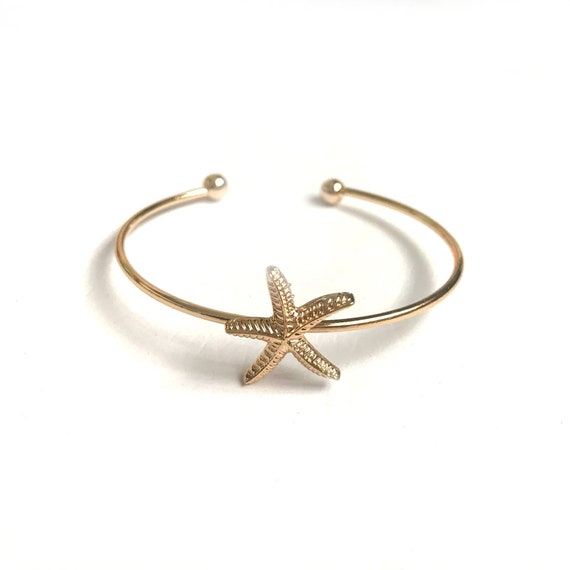 Gold starfish best sale bracelet