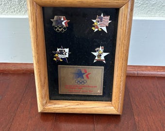 vintage 1984 Los Angeles Olympic Games commemorative pin set with wooden frame