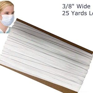 May include: A white elastic band, 3/8 inch wide and 25 yards long, is rolled up on a brown cardboard backing.  3/8" Wide 25 Yards Long is printed on the backing.