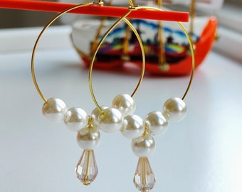 Simple golden hoop and pearl earrings