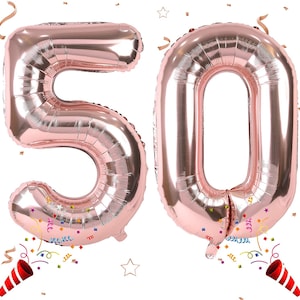May include: Two large rose gold foil balloons in the shape of the numbers 5 and 0. The balloons are inflated and ready to be used for a party or celebration.