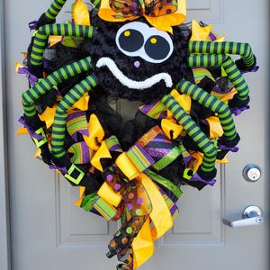 Halloween-krans lachende spin | Leuk en kleurrijk Halloween-deurdecor