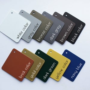 May include: Color swatches in various shades of white, grey, bronze, dark grey, brown, black, brick, gold, dark green, yellow, and navy blue. Each swatch has the color name written below it.