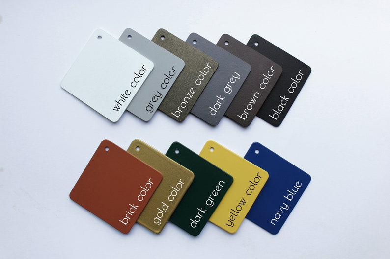 May include: Color swatches in various colors, including white, grey, bronze, dark grey, brown, black, brick, gold, dark green, yellow, and navy blue. Each swatch has the color name written below it.