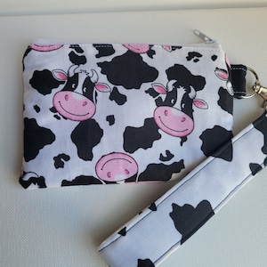 Holstein cow face, cow print card size wristlet with matching keychain. Keychain wristlet for cards, lipbalm. Wristlet for handsfree carry,